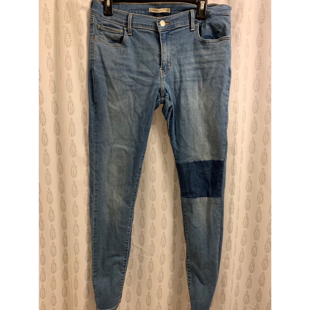 Levi’s Mid-Rise Patched Jeans